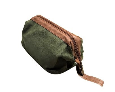 Bellemonde Millwood Green Faux Suede Dopp Kit shown from the side with an engraved zipper pull and light brown loop handle